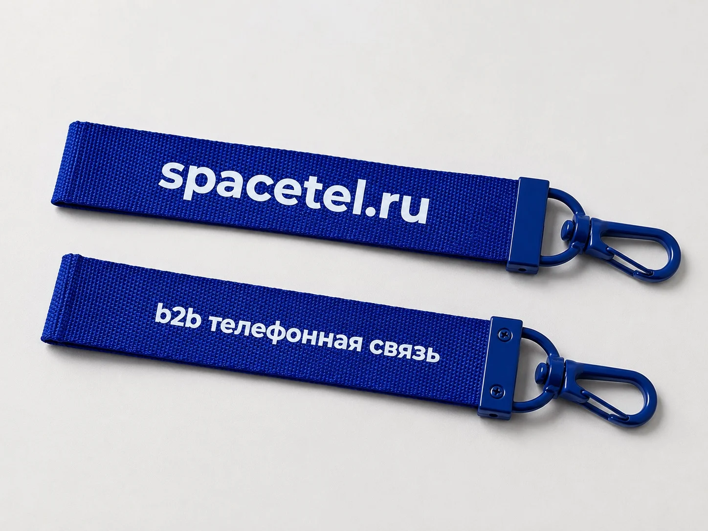 Синие текстильные брелоки Spacetel с двусторонними надписями